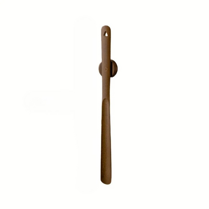 Smooth beech wood ergonomic shoehorn with magnetic base, a practical and stylish footwear accessory.
