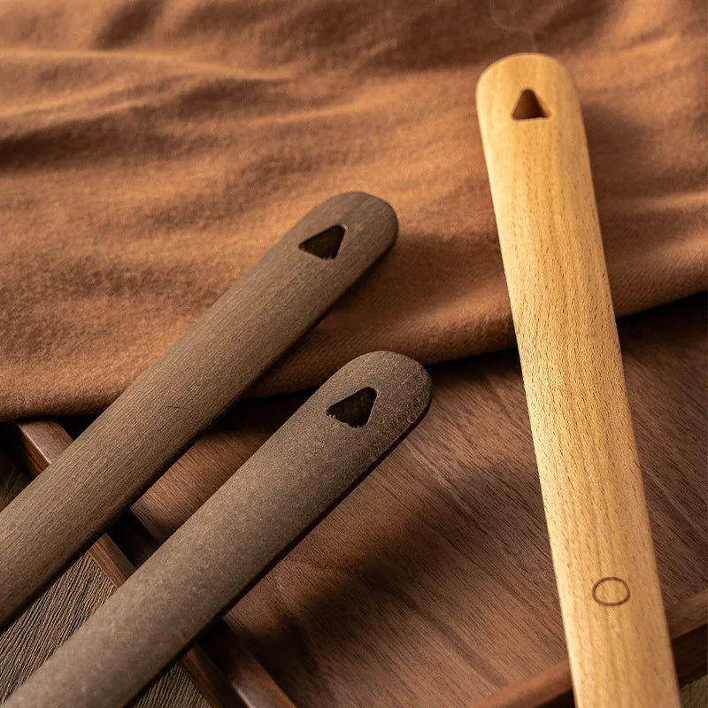 Premium beech wood magnetic shoehorn, an ergonomic and convenient footwear accessory, ideal as a gift.