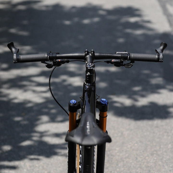 Comfortable ergonomic handlebar grips designed for pain relief & improved control on long bike rides.