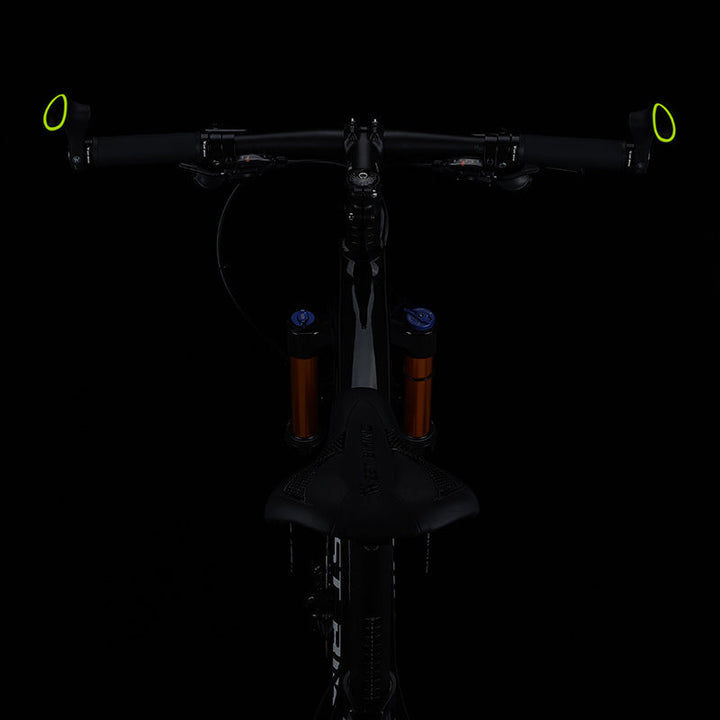 Black ergonomic mountain bike grips, anti-slip rubber for enhanced comfort & control during intense rides.