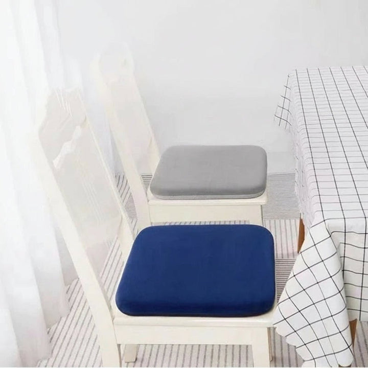 Comfortable memory foam car seat cushion for tailbone pain relief & ergonomic back support during drives.