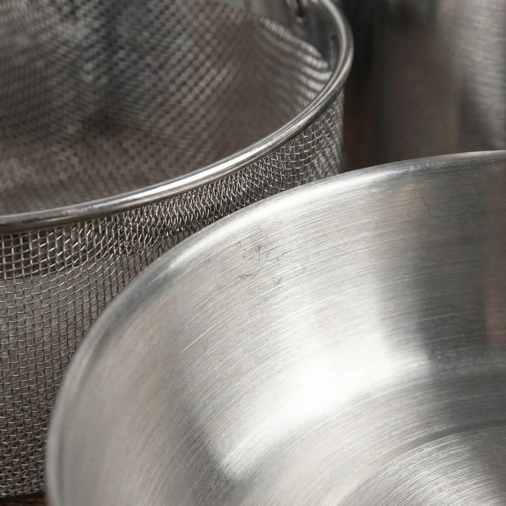 Durable stainless steel outdoor cookware set for family camping, hiking, and portable kitchen needs.