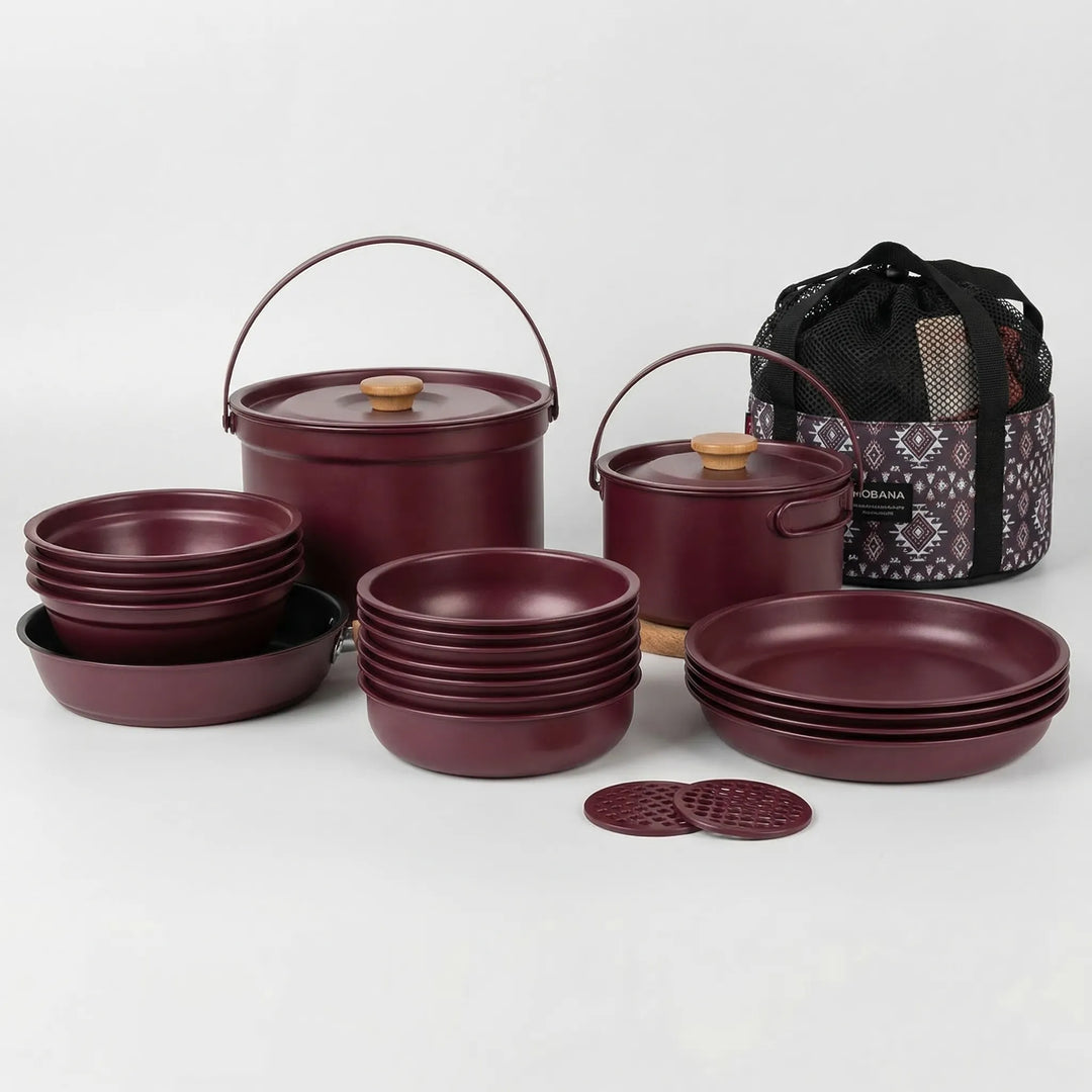 Portable outdoor kitchen set, stainless steel camping pots & pans for family adventure cooking.