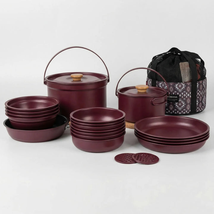 Portable outdoor kitchen set, stainless steel camping pots & pans for family adventure cooking.