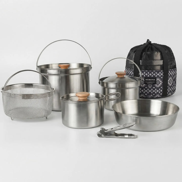 Compact family camping cookware, portable stainless steel pots for outdoor cooking & hiking trips.