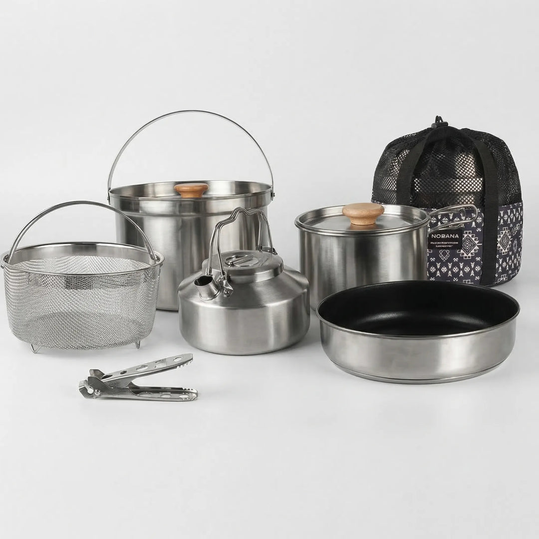 Versatile family outdoor cookware set, compact stainless steel pots for camping, hiking, & picnics.