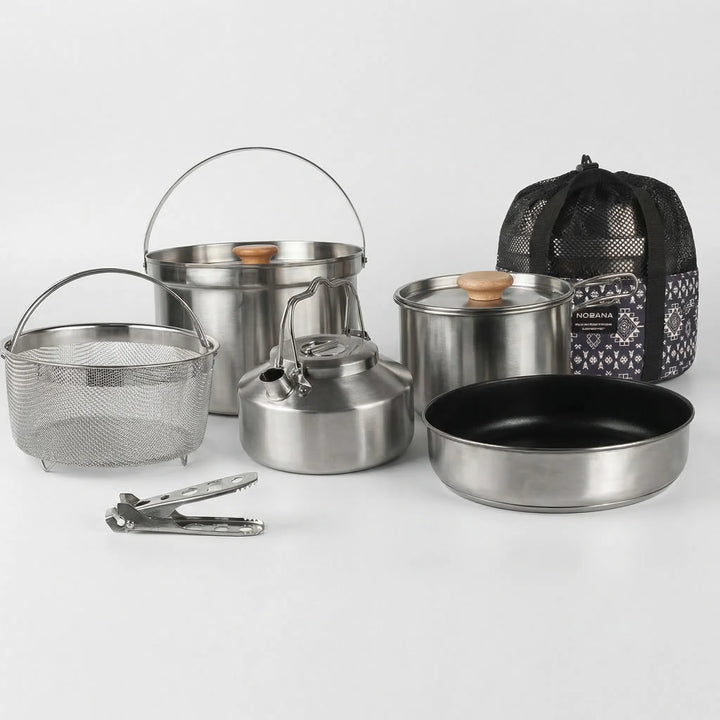 Versatile family outdoor cookware set, compact stainless steel pots for camping, hiking, & picnics.