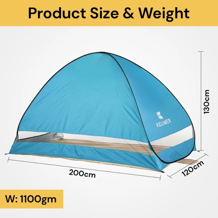 Interior view of family pop-up beach tent, spacious for shade & wind protection, with sand floor
