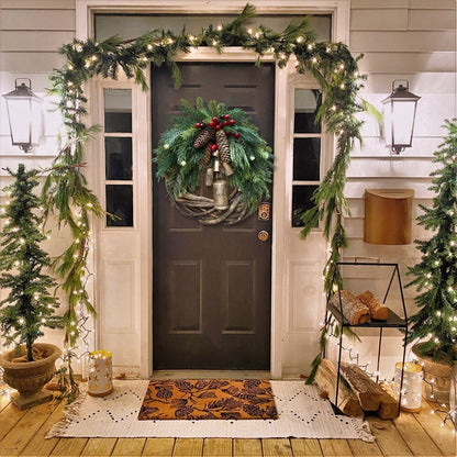 Rustic boho style Christmas wreath, a charming farmhouse holiday door decoration with artificial winter greens & festive details.