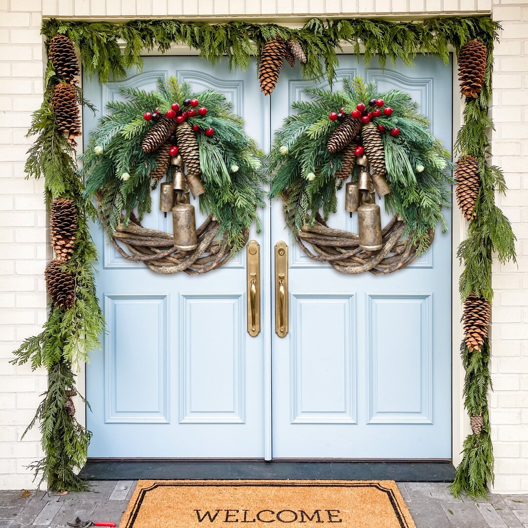 Artificial farmhouse Christmas wreath, rustic boho winter greens door decor for a festive and lasting holiday seasonal display.