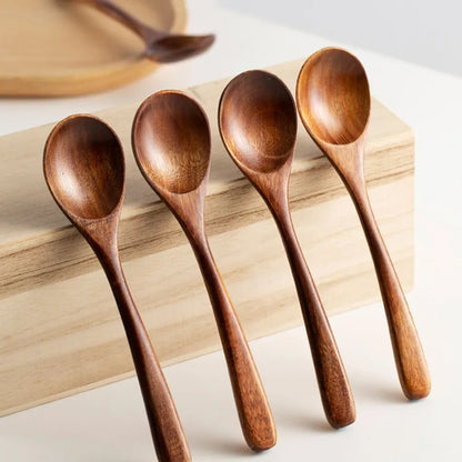 Versatile wooden spoon set for all kitchen tasks. Includes stirring, serving, & cooking tools in natural wood.