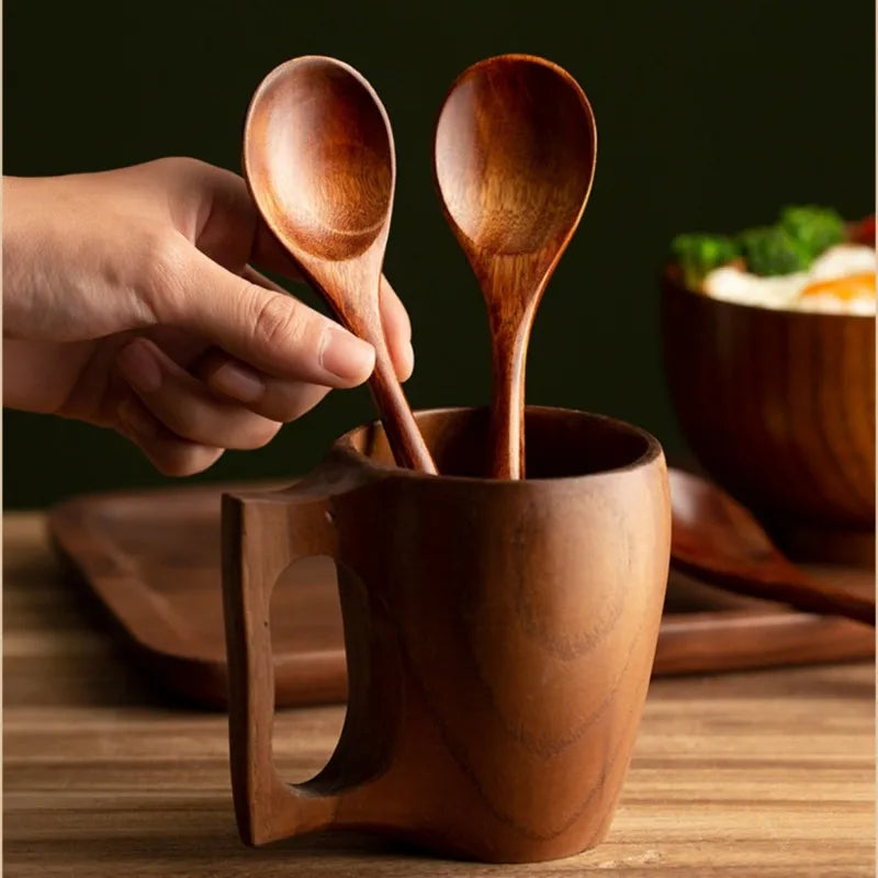 Premium farmhouse wood spoon set, perfect gift for home cooks. Essential natural wooden kitchen utensils.