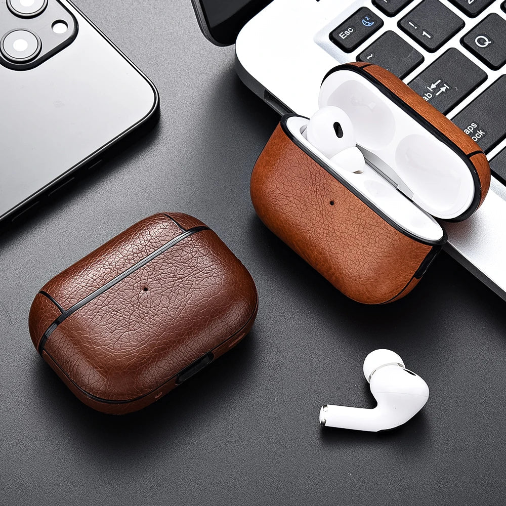 Faux leather protective case for wireless earbud chargers, durable and stylish tech accessory.