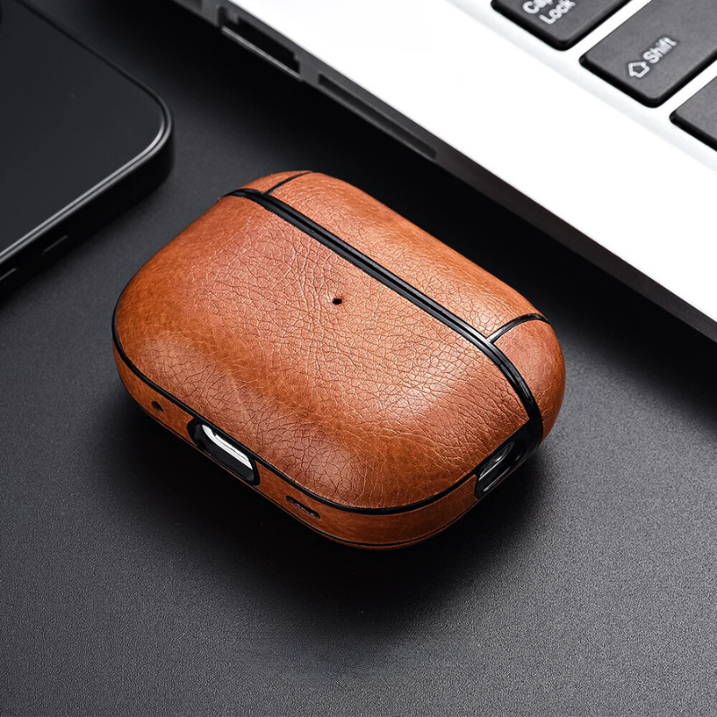 Stylish faux leather earbud charging case, a durable and protective cover for wireless chargers.