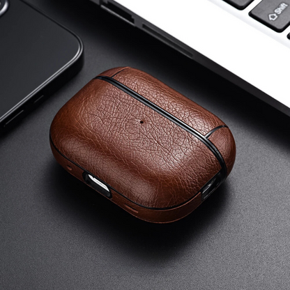 Durable faux leather case for wireless earbud chargers, provides secure and non-slip protection.