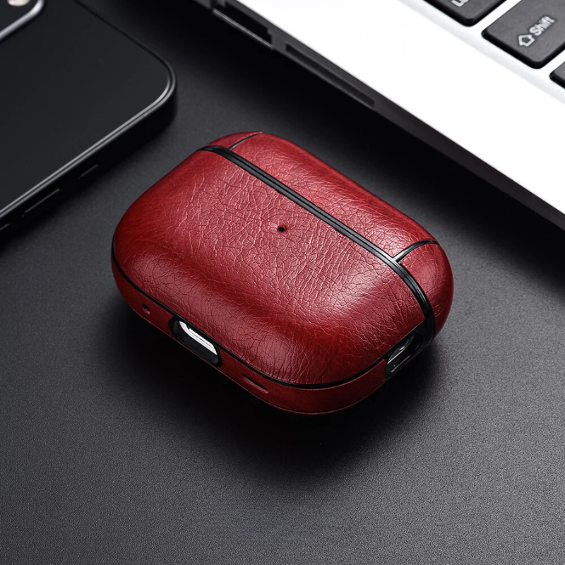 Faux leather earbud charger case, a protective and durable accessory for wireless charging.