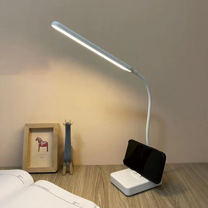 Dimmable LED desk lamp for ultimate flexibility. Perfect reading light or workspace task lamp, modern design.