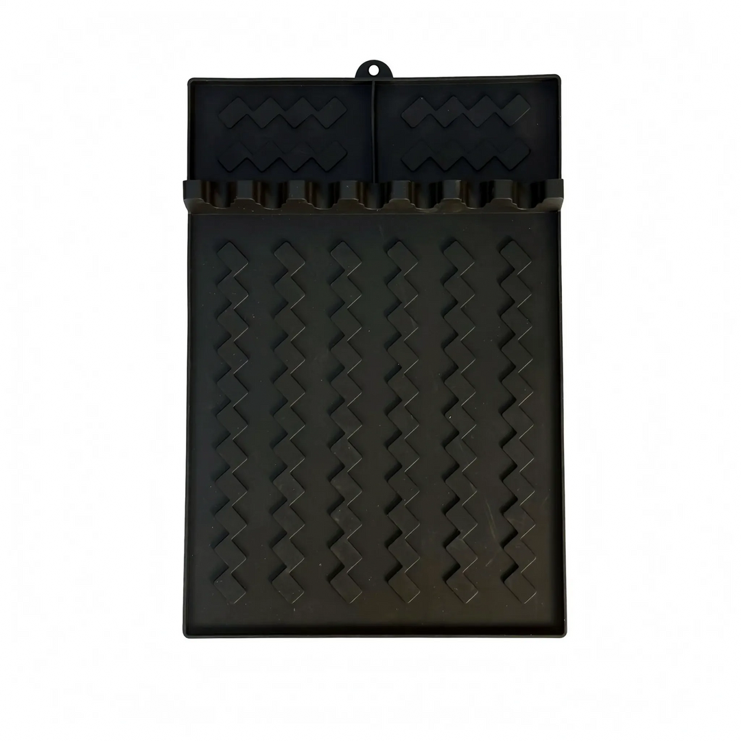 Portable silicone BBQ utensil rest & kitchen organizer, keeps grill areas tidy; ideal for camping & backyard cooking.
