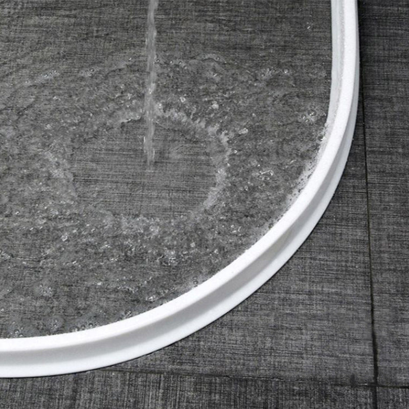 Bathroom water seal: flexible silicone barrier for a splash-free, dry shower experience.