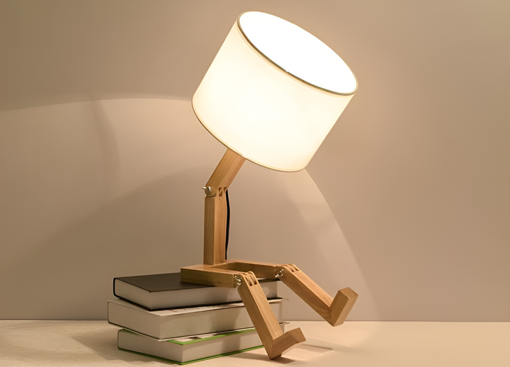 Solid wood robot lamp, flexible design for versatile desk & home lighting. Sustainable & stylish.