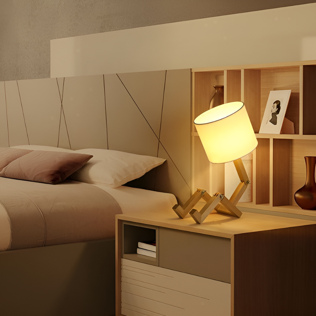 Playful wooden robot desk lamp with flexible joints, perfect for kids' rooms or creative office lighting.