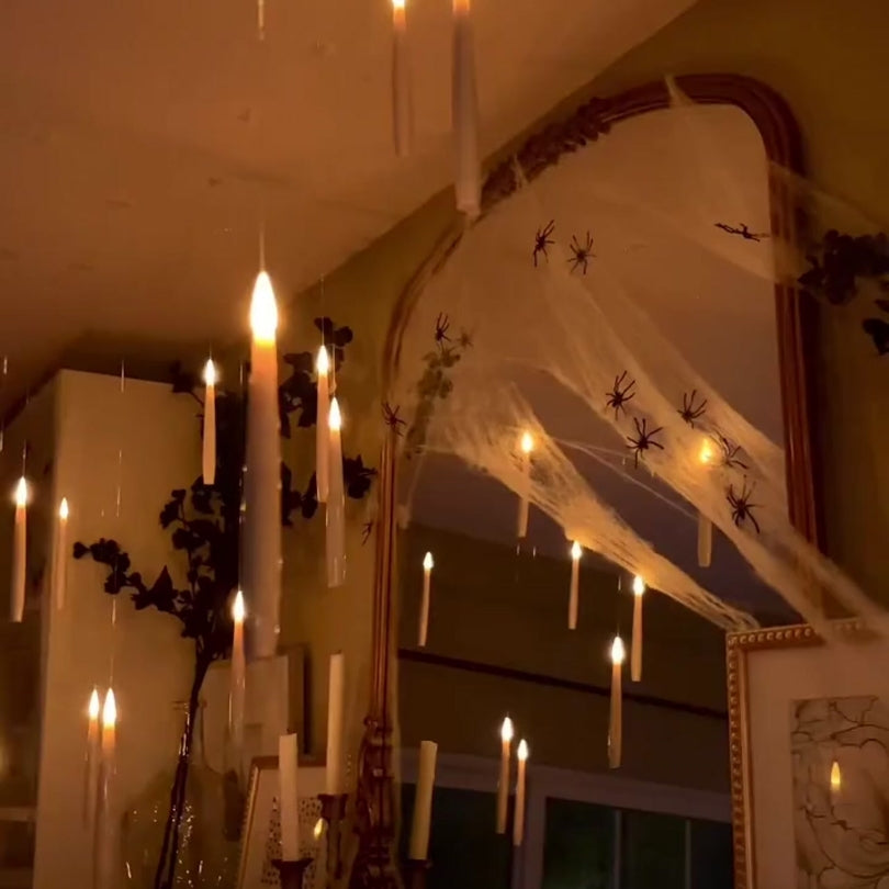 Battery-operated floating LED candles with remote control, ideal for Halloween decor & DIY magical party lights.