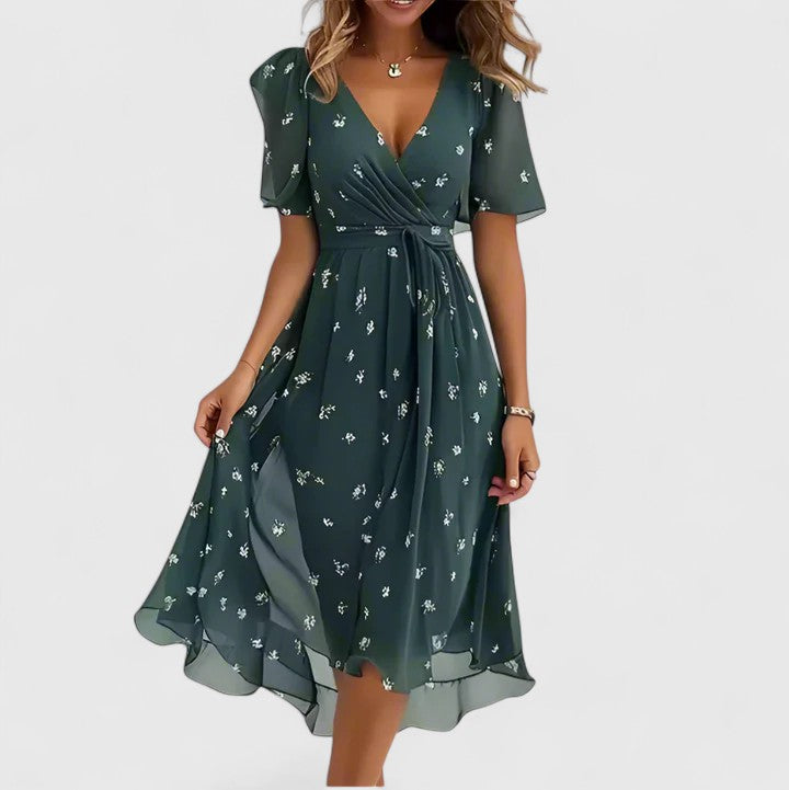 Chic women's floral garden party dress, plunge V-neck, flutter sleeves, and midi length.