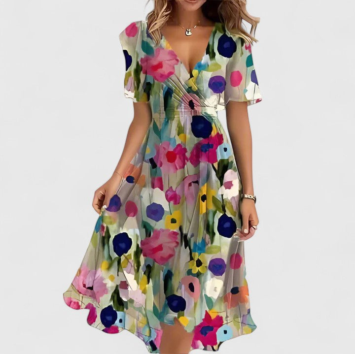 Vibrant floral flutter sleeve midi dress for women, perfect for spring and summer fashion.