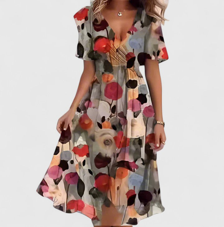 Women's elegant floral midi dress with a flattering plunge V-neck and airy flutter sleeves.