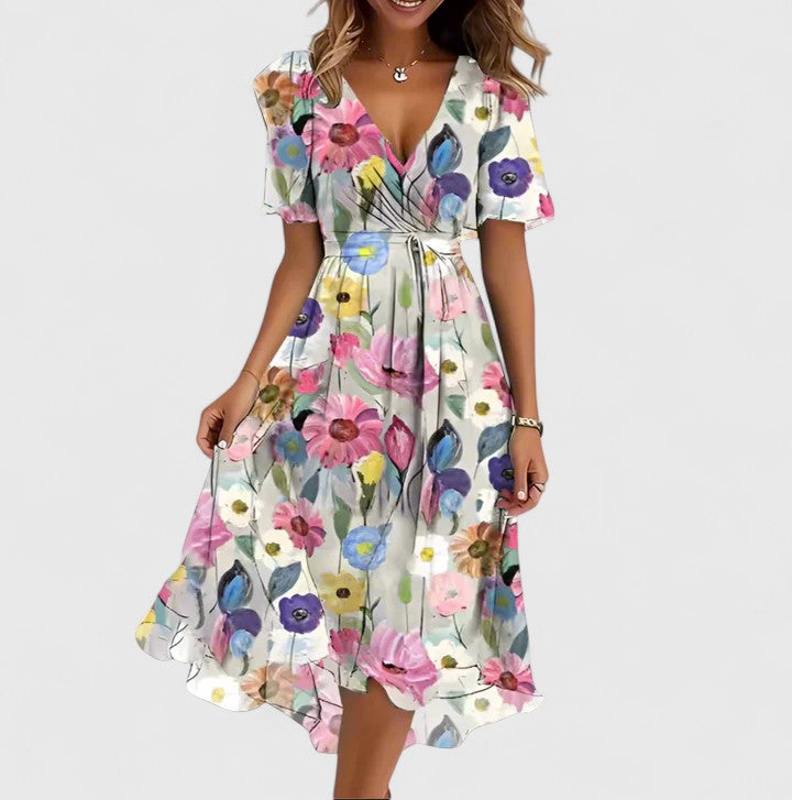 High-low hem floral midi dress for women, featuring a plunge V-neck and pretty flutter sleeves.