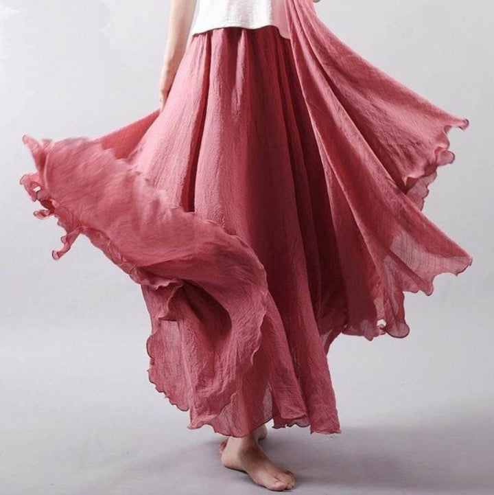 Elegant women's A-line flowing maxi skirt with high waist, ideal for comfortable bohemian summer fashion.