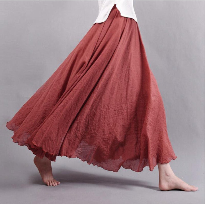 Relaxed women's flowing bohemian maxi skirt with high waist, ideal for comfortable summer vacation & beach outfits.