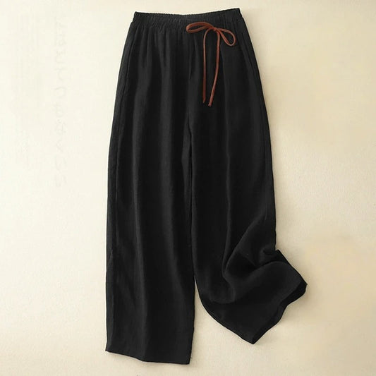Flowy wide-leg women's trousers for ultimate comfort & chic casual style, perfect for summer.
