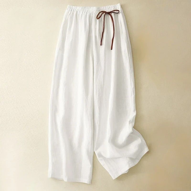 Red wide-leg resort wear trousers, comfortable and stylish for effortless summer chic and versatile outfits.