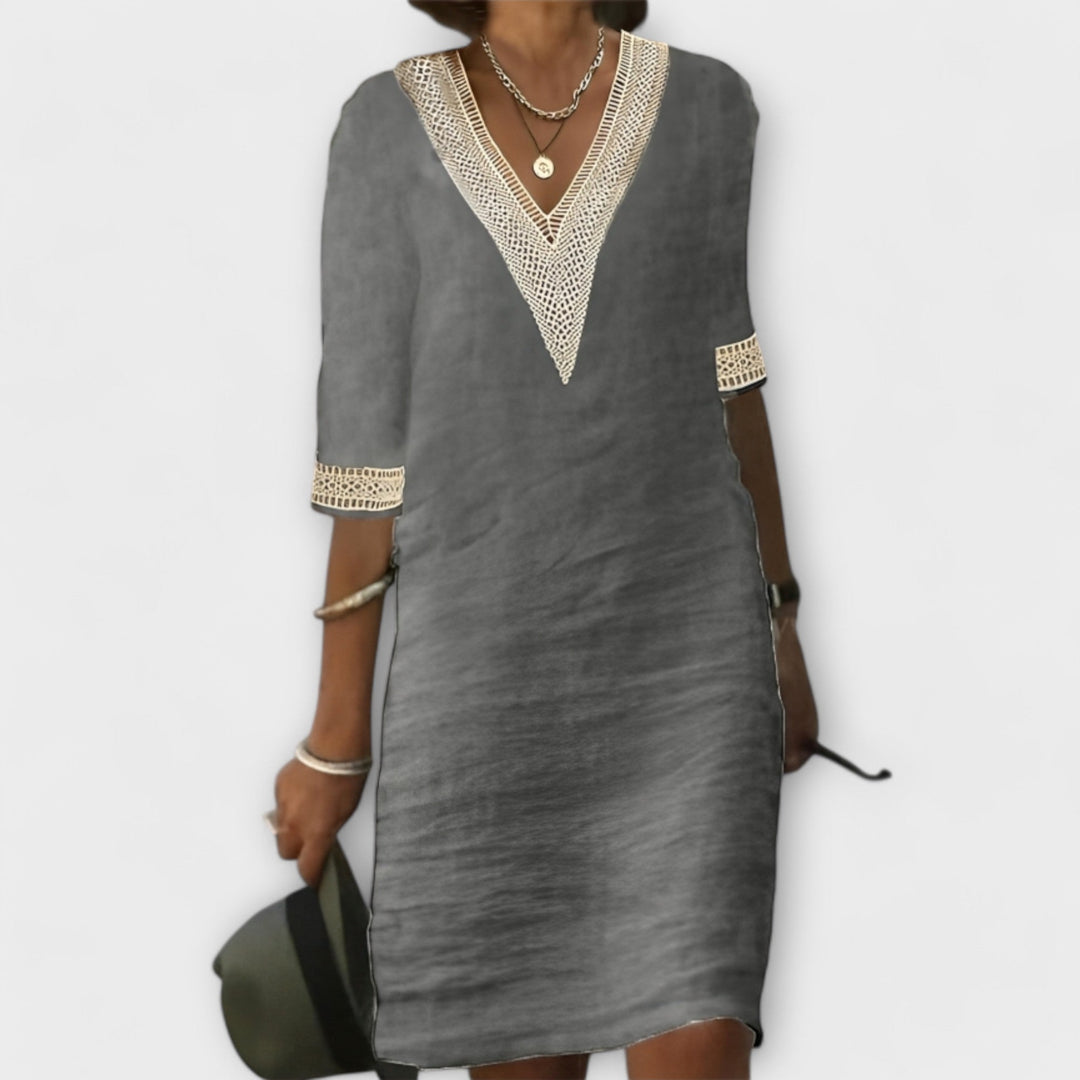 Boho-chic women's flowy crochet dress with delicate openwork and round neck, a stylish choice for summer and beach days.