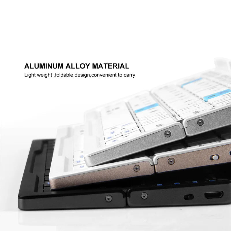 Durable aluminum alloy foldable keyboard, wireless and portable with a magnetic stand for various devices.