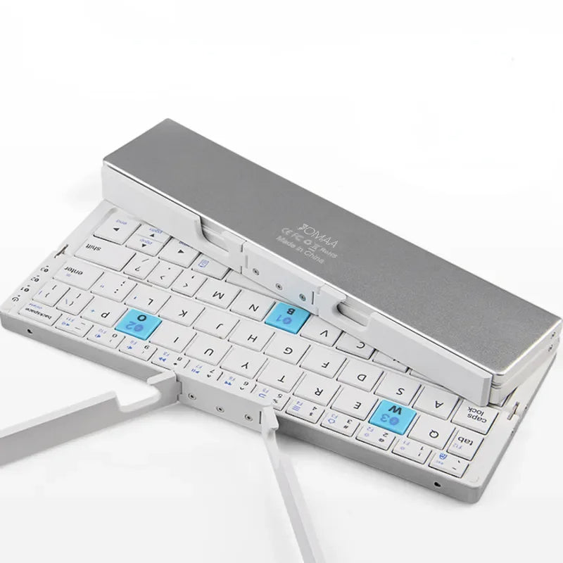 Tablet wireless keyboard: portable, foldable Bluetooth design with a strong magnetic stand for stable typing.