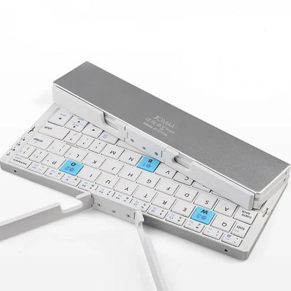 Tablet wireless keyboard: portable, foldable Bluetooth design with a strong magnetic stand for stable typing.