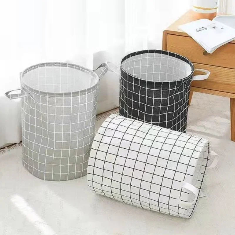 Decorative foldable Liora laundry basket, cotton linen, perfect for toy storage or stylish household organization.