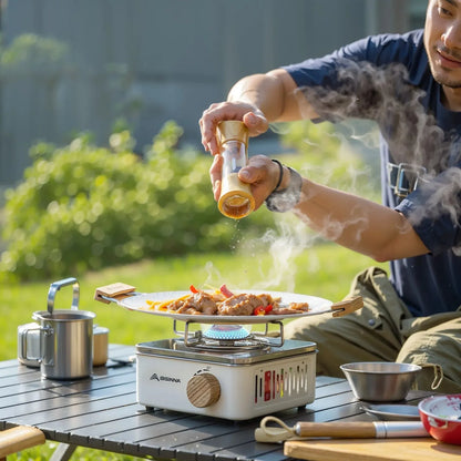 Lightweight mini foldable camping stove, perfect for backpacking, features stable pot support for outdoor meals.