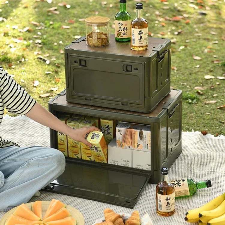 Portable outdoor storage solution with a dual-purpose cutting board lid for camping and travel