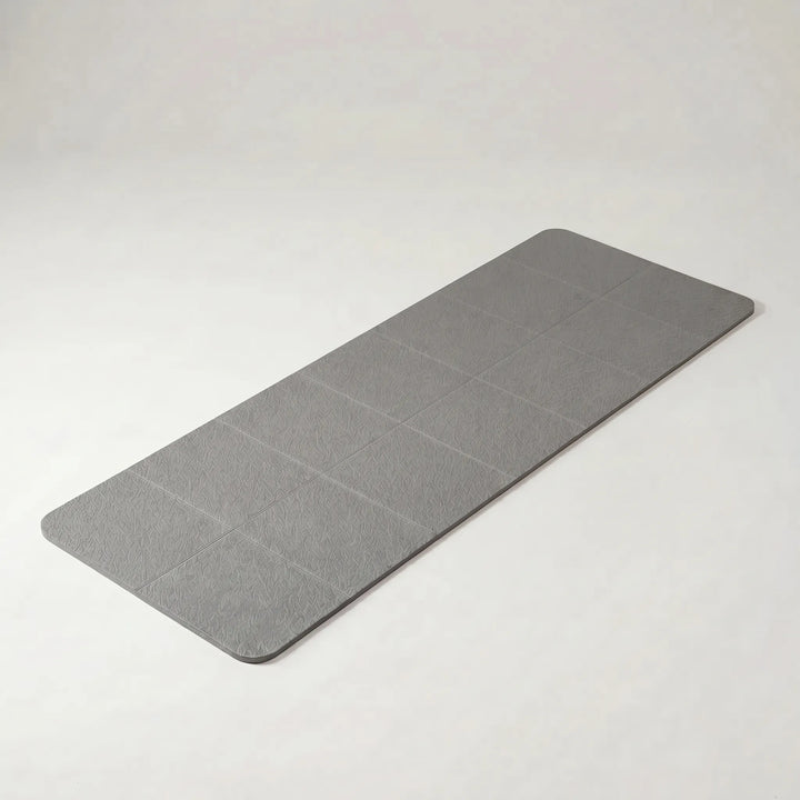 Non-slip TPE foldable yoga mat, ideal for travel. Portable exercise mat for fitness, gym, yoga, & pilates.