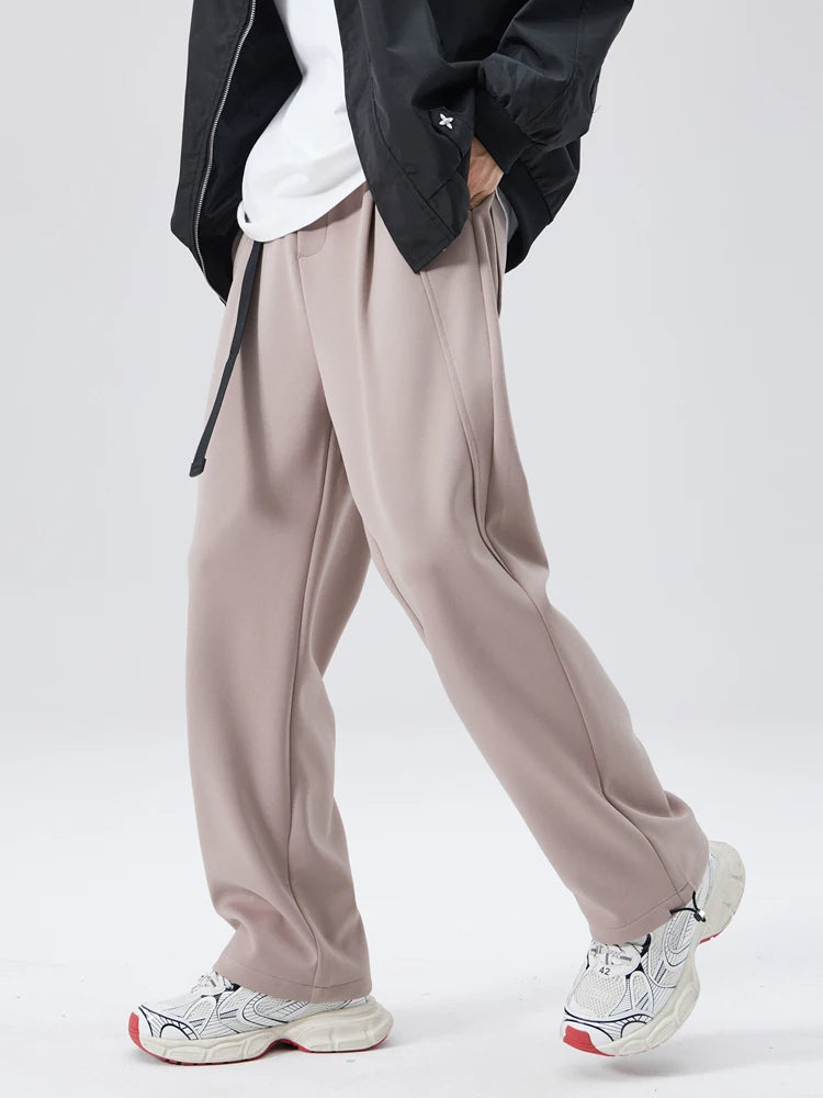 Stylish men's wide-leg trousers, ideal for modern comfort and a relaxed, fashion-forward statement.
