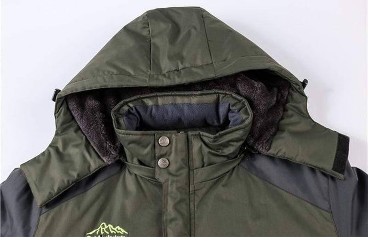Side profile of men's insulated waterproof parka jacket, ideal for snow and outdoor hiking