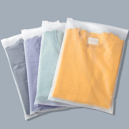 A stack of 20 frosted zipper storage bags, ideal for home storage & travel organization.