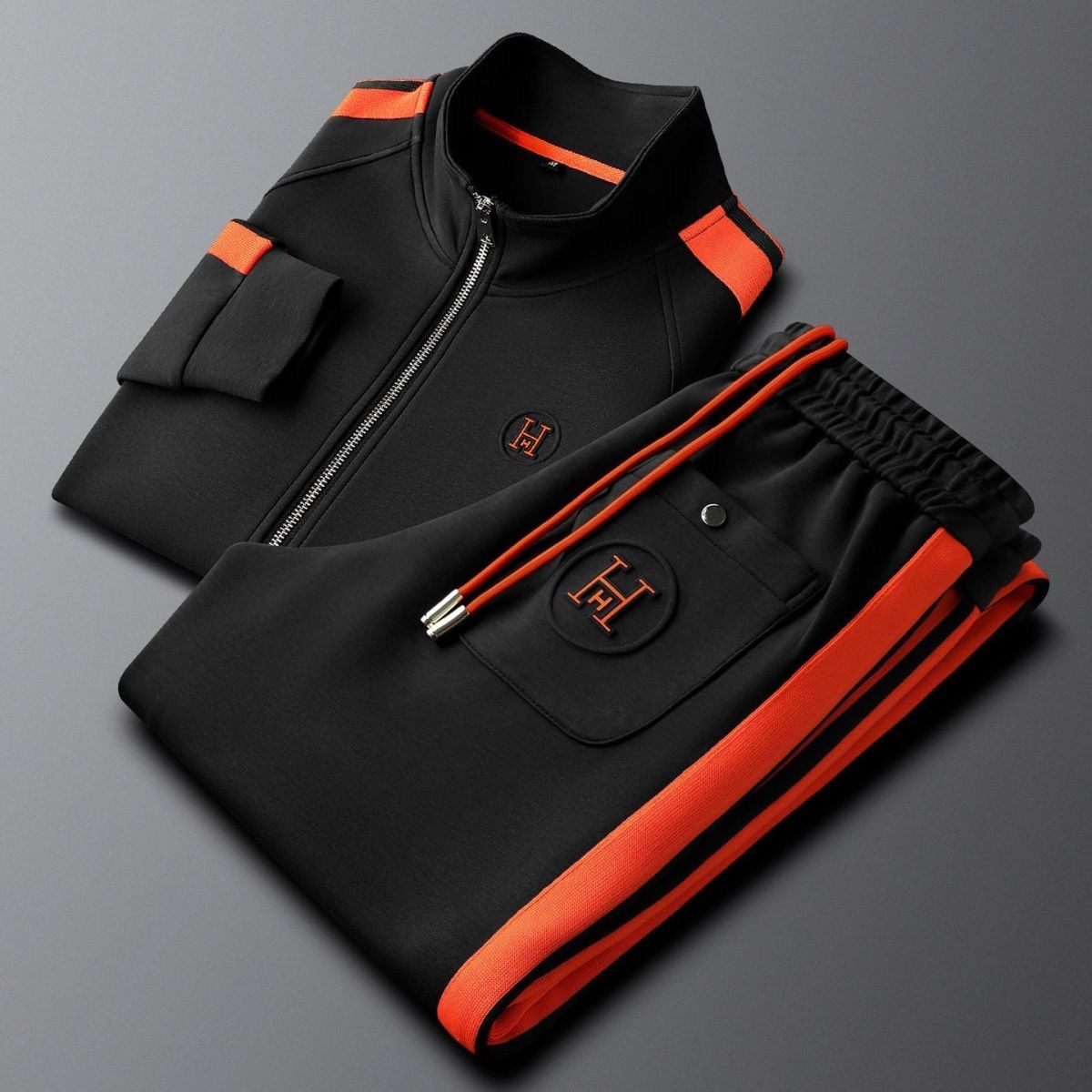 Comfortable men's track suit bottom with elastic waist & contrast stripe, great for sportswear.