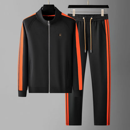 Man walking in men's Riviera track suit, highlighting the ease & style of this leisure wear set.