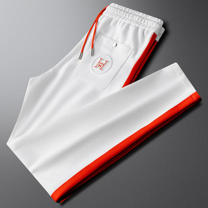 Front view of men's Riviera track suit top, a stylish piece of men's athletic wear with contrast accents.