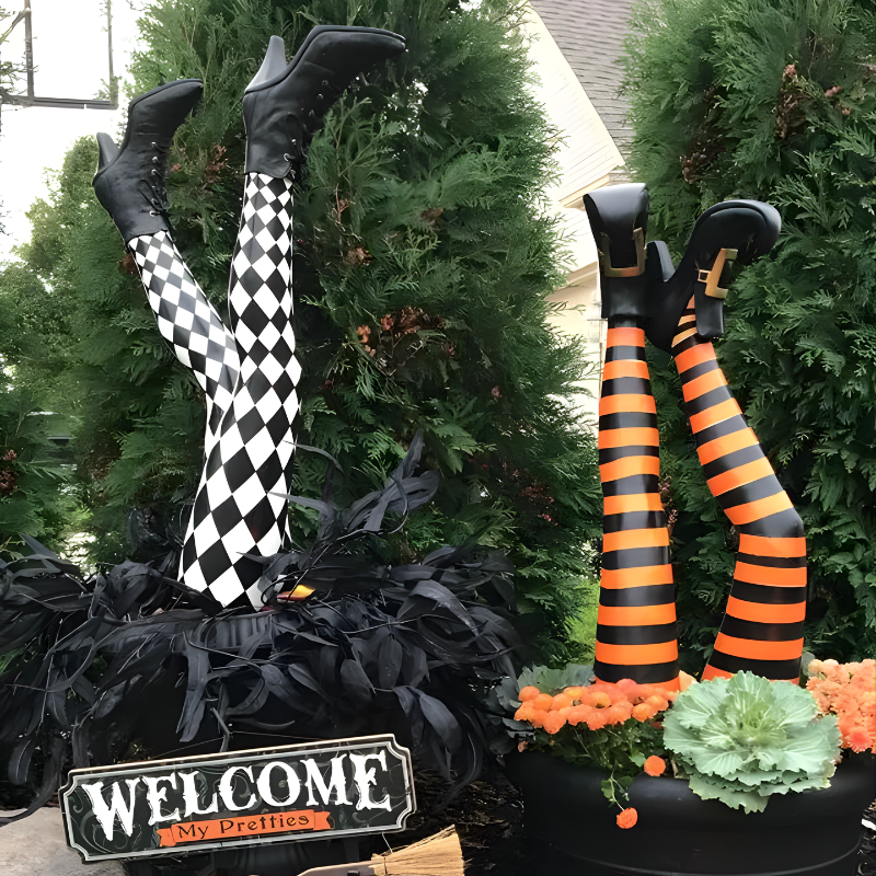 Decorative witch legs yard stakes, perfect for funny Halloween outdoor garden and lawn display.