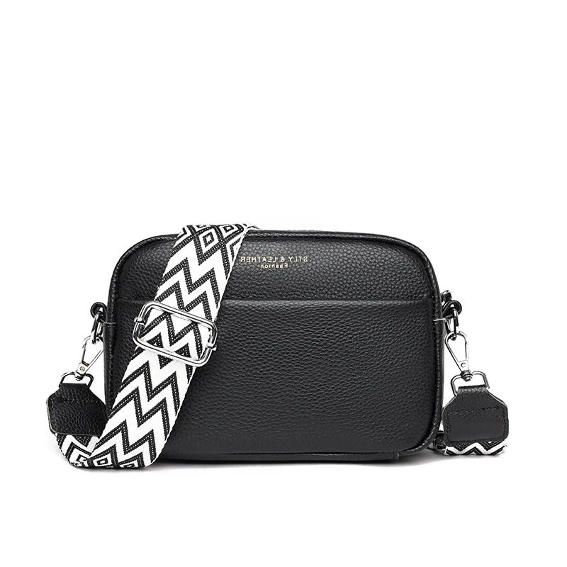 Premium hardware detail on a genuine leather women's tote, enhancing luxury and durability.